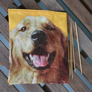 Double-pointed needle bag made from a recycled dog food bag 